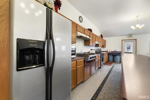 kitchen with a chandelier, decorative light fixtures, and stainless steel appliances