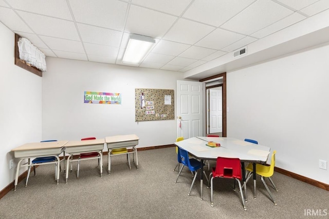 game room with carpet flooring and a drop ceiling