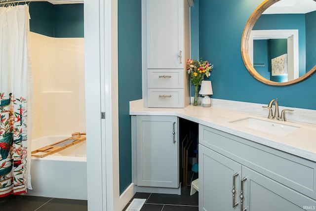 bathroom featuring shower / bath combo, vanity, and tile patterned floors