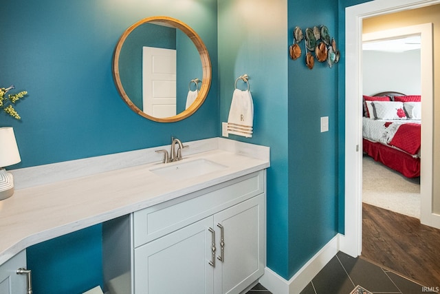 bathroom featuring tile patterned floors and vanity