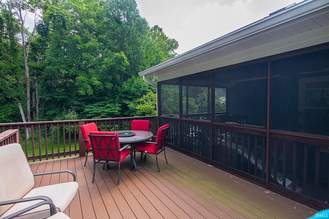 deck with a sunroom