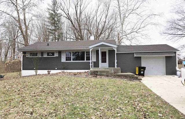 single story home with a front yard and a garage