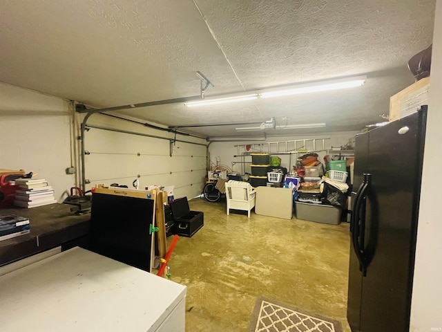 garage with black fridge