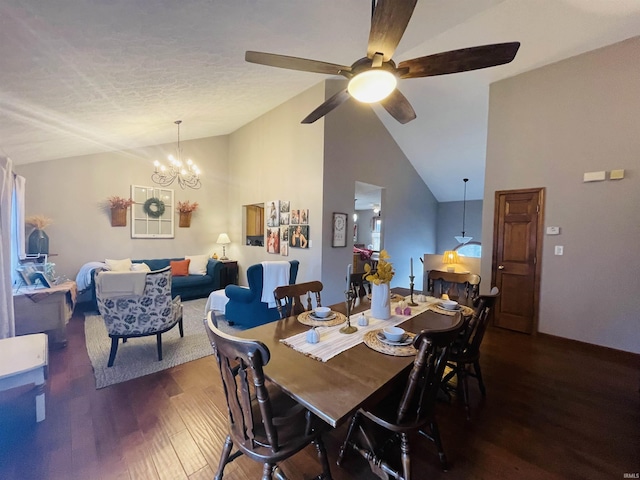 dining area featuring a textured ceiling, dark hardwood / wood-style flooring, high vaulted ceiling, and ceiling fan with notable chandelier