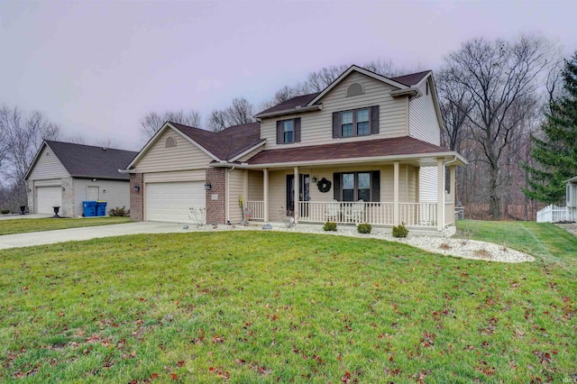 view of front facade with a porch, a garage, and a front yard