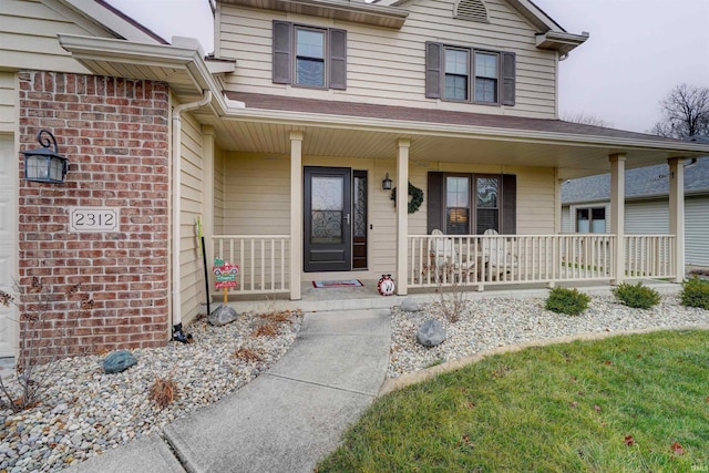 entrance to property with a porch