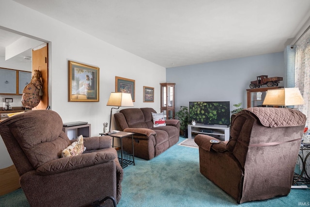 carpeted living room with a healthy amount of sunlight