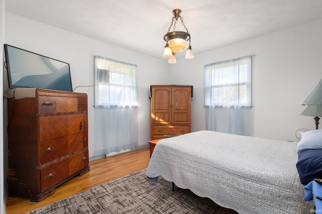 bedroom featuring light hardwood / wood-style flooring