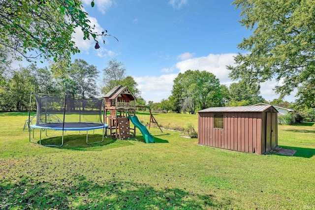 view of playground featuring a storage shed, a trampoline, and a yard