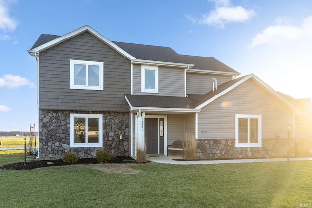 view of front of property with a front lawn