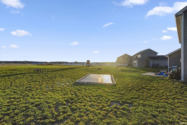 entry to storm shelter with a rural view