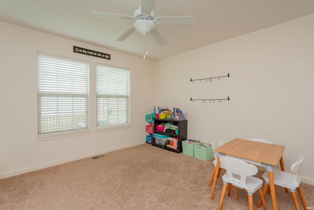 playroom featuring carpet floors and ceiling fan