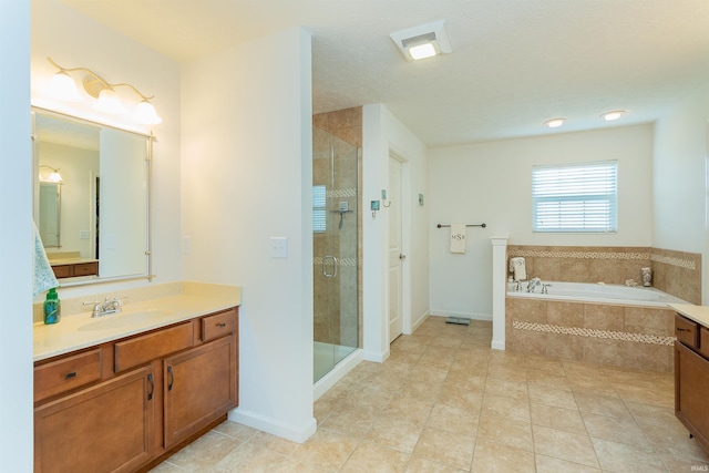 bathroom with separate shower and tub, tile patterned flooring, and vanity