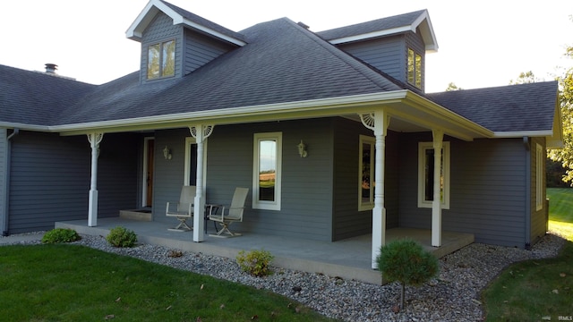 view of front of property featuring covered porch