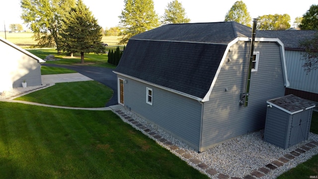 view of property exterior with a lawn