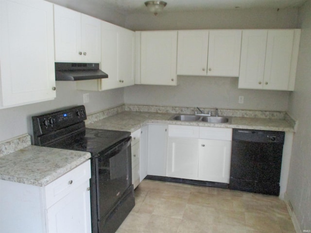 kitchen with sink, black appliances, and white cabinets