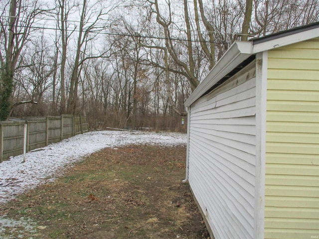 view of yard covered in snow