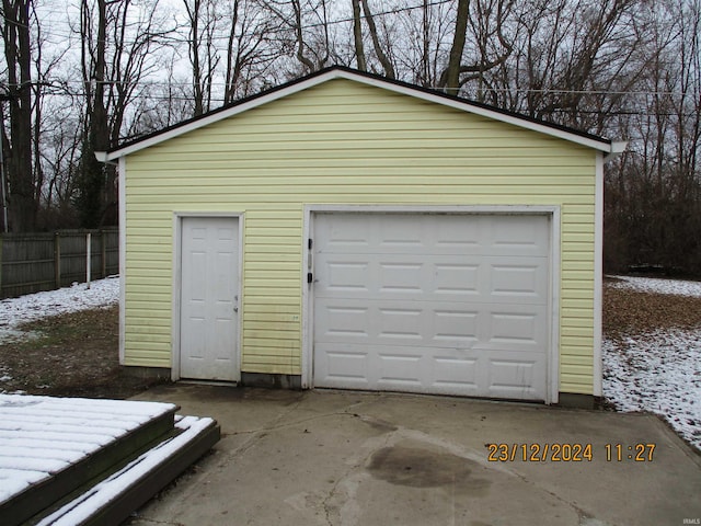 view of snow covered garage