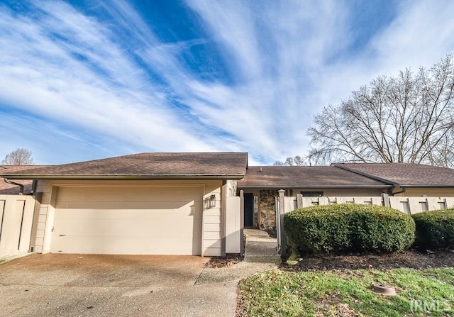 single story home featuring a garage