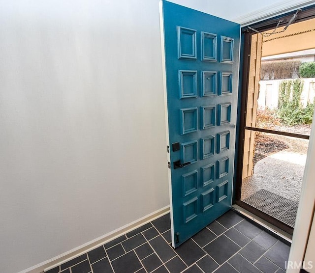 view of tiled foyer entrance