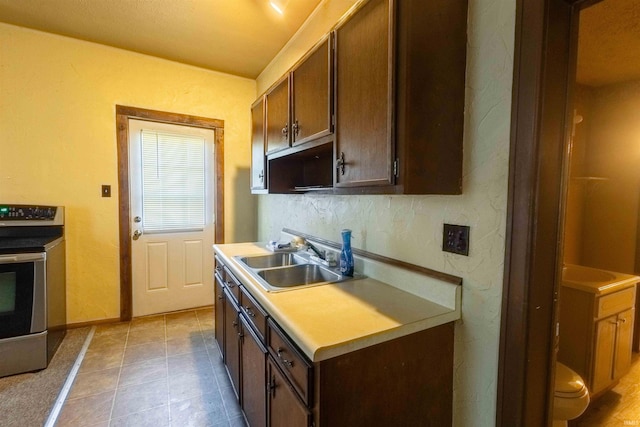 kitchen featuring sink and range