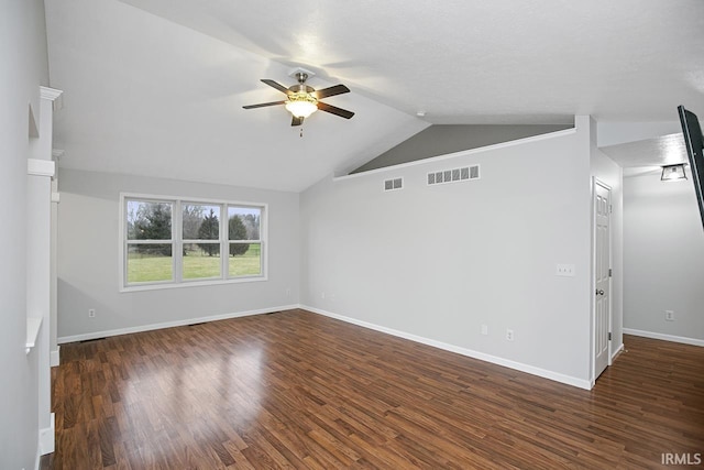 unfurnished living room with ceiling fan, dark hardwood / wood-style flooring, a textured ceiling, and vaulted ceiling