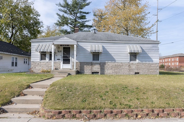 view of front of home featuring a front yard