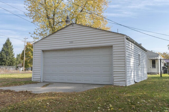 garage with a lawn