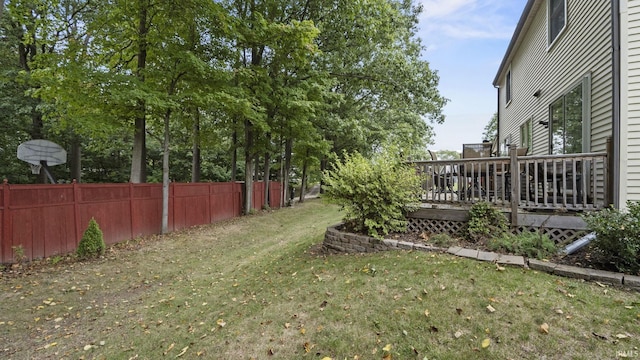 view of yard featuring a wooden deck