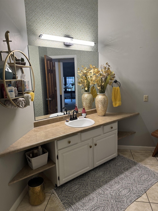 bathroom with tile patterned flooring and vanity