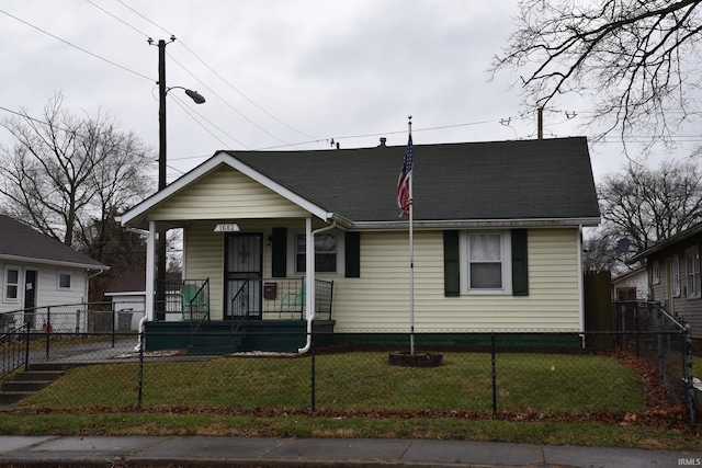 bungalow-style house featuring a front yard and a porch