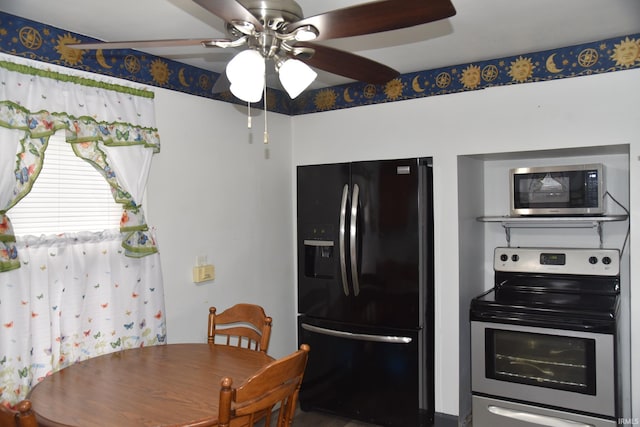 kitchen featuring ceiling fan and appliances with stainless steel finishes