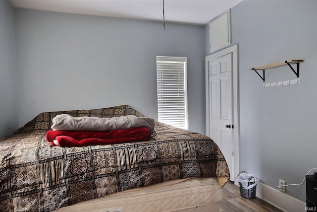 bedroom with light hardwood / wood-style floors