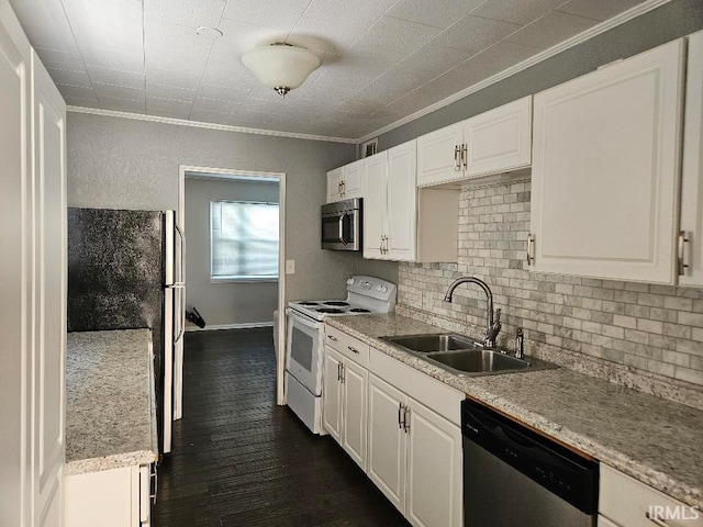 kitchen featuring white cabinets, dark wood-type flooring, stainless steel appliances, sink, and ornamental molding