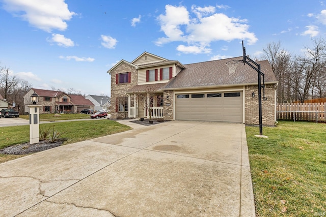 front of property featuring a garage and a front lawn