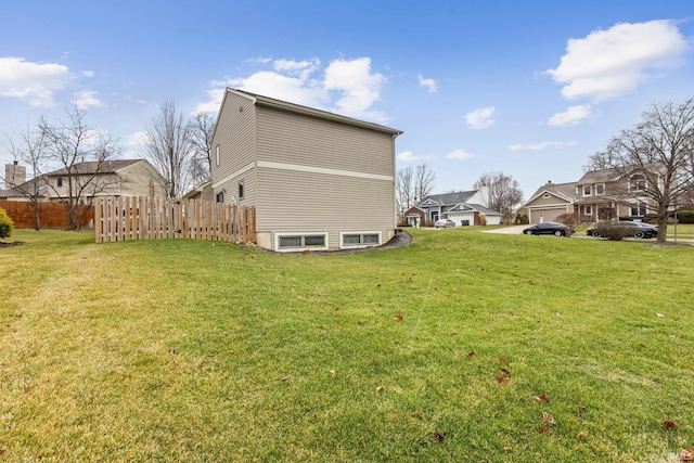 view of home's exterior featuring a lawn