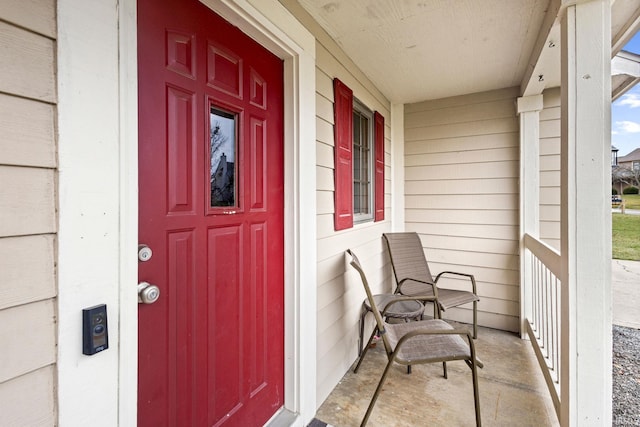 entrance to property with covered porch