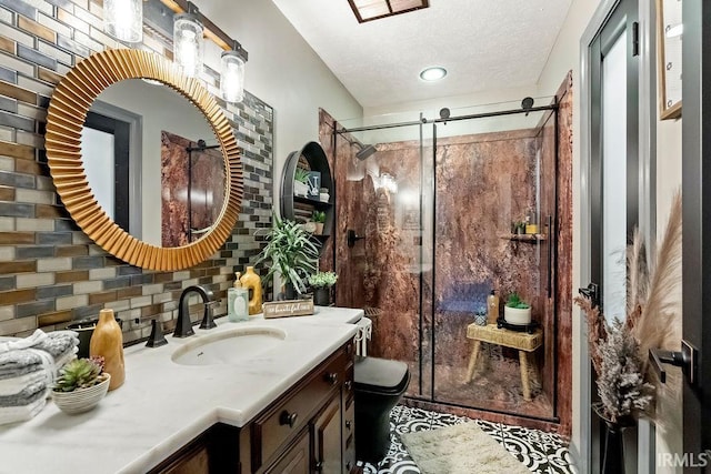 bathroom featuring vanity, decorative backsplash, toilet, a textured ceiling, and walk in shower