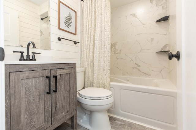 full bathroom featuring vanity, wood walls, toilet, and shower / tub combo with curtain