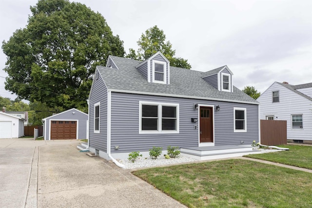 cape cod-style house featuring a garage, an outbuilding, and a front lawn