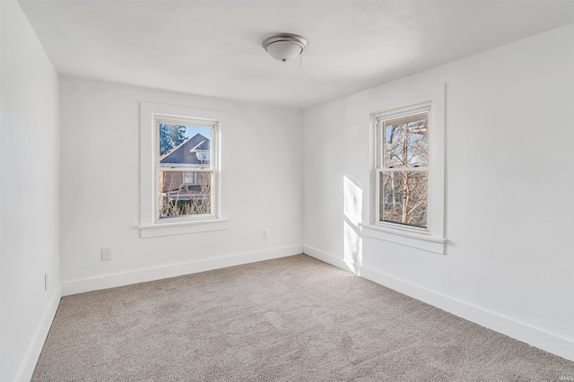 empty room featuring carpet flooring