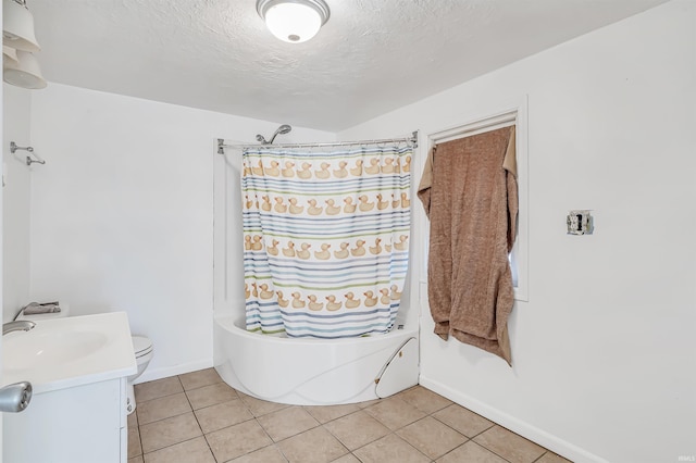 full bathroom with shower / bath combo, vanity, tile patterned floors, toilet, and a textured ceiling