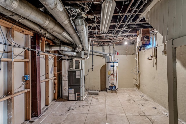 basement with heating unit and water heater