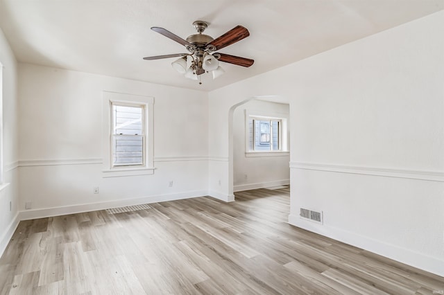 unfurnished room featuring ceiling fan and light hardwood / wood-style flooring