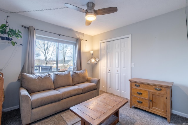 living room featuring light carpet and ceiling fan