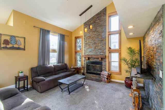 living room with carpet, a fireplace, and high vaulted ceiling