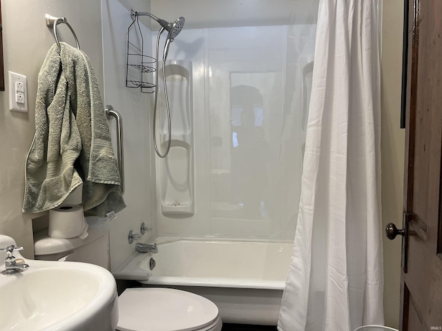 full bathroom featuring shower / tub combo, toilet, and sink