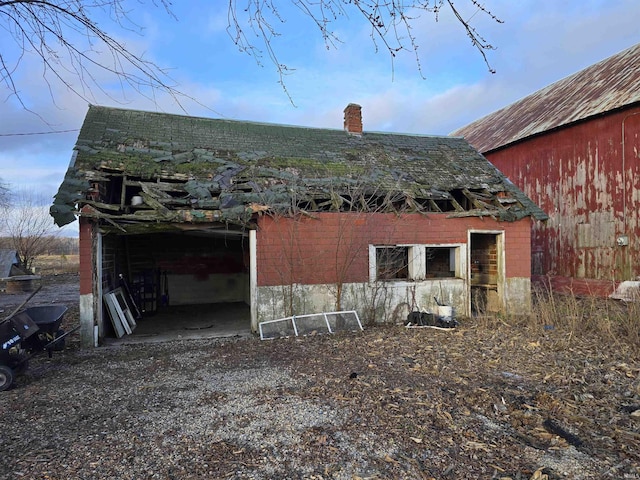 view of side of property with a garage