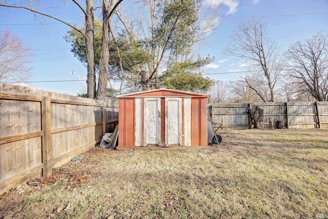 view of outbuilding with a yard