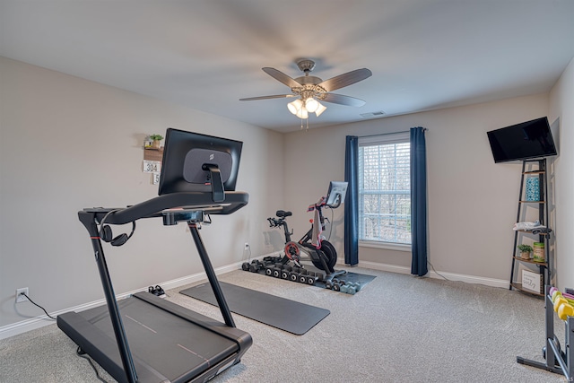 workout room featuring carpet floors and ceiling fan